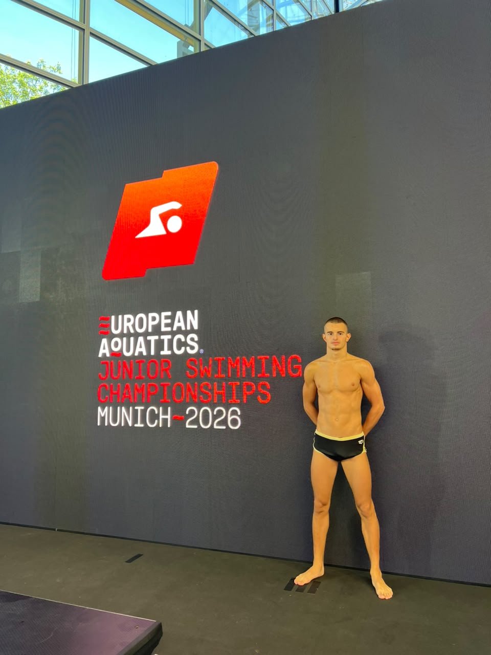 Klint Hoxha at the European Junior Swimming Championships sign, Munich 2026